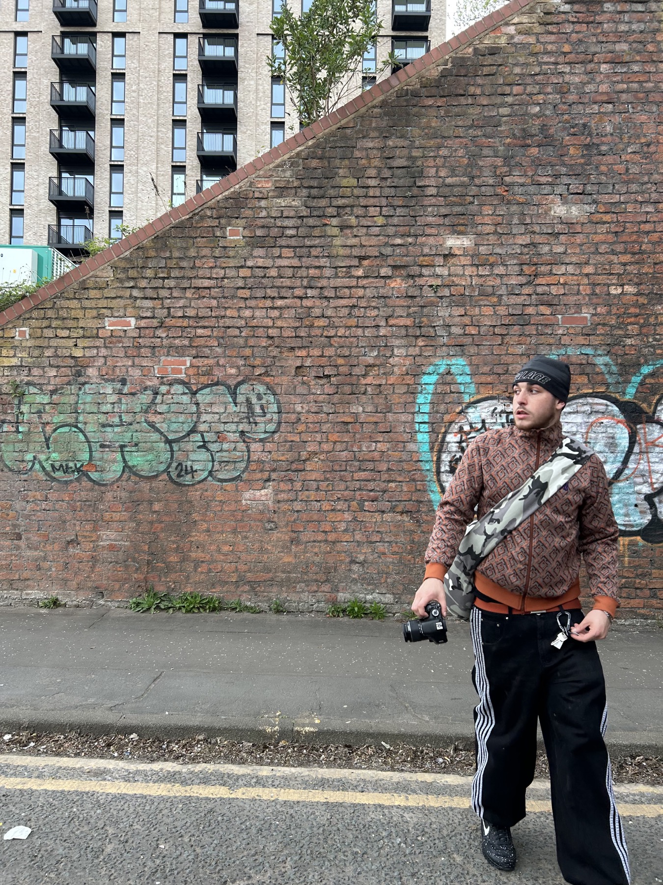 Benji scouting an urban location with his camera