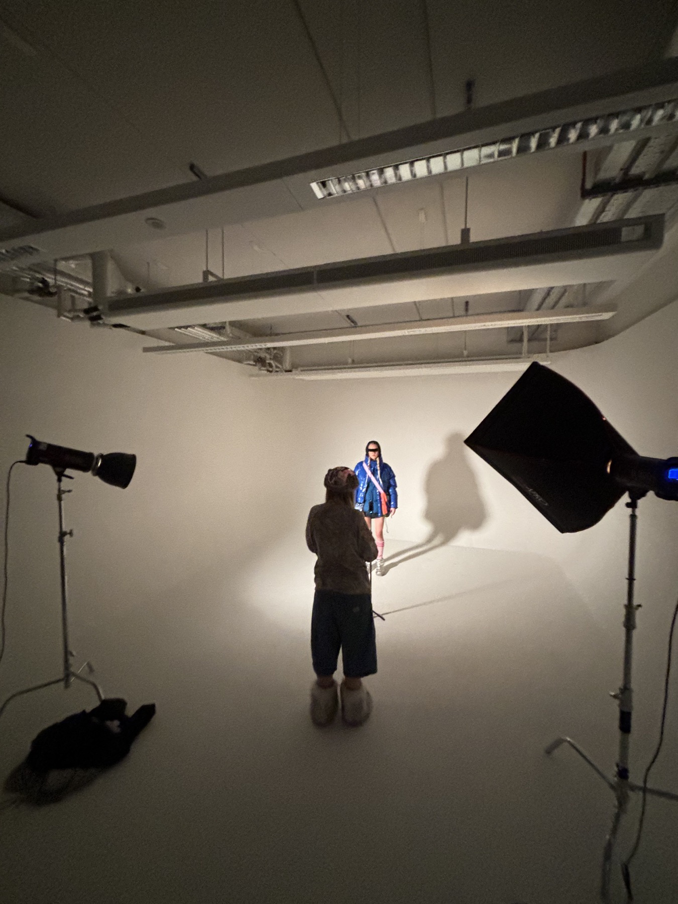 A fashion shoot taking shape inside a large studio